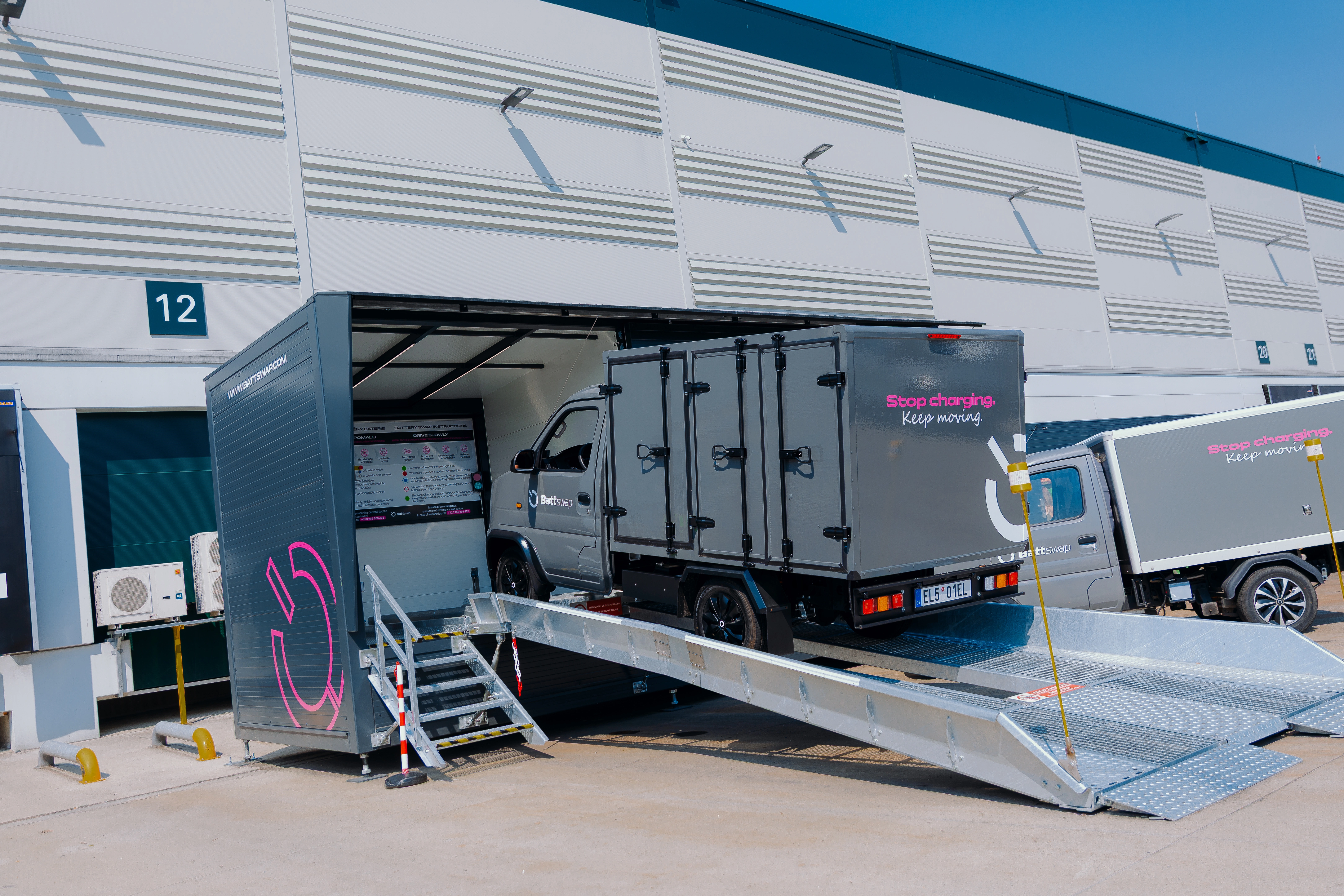 A Battswap van standing inside the swap station at the top of its ramp
